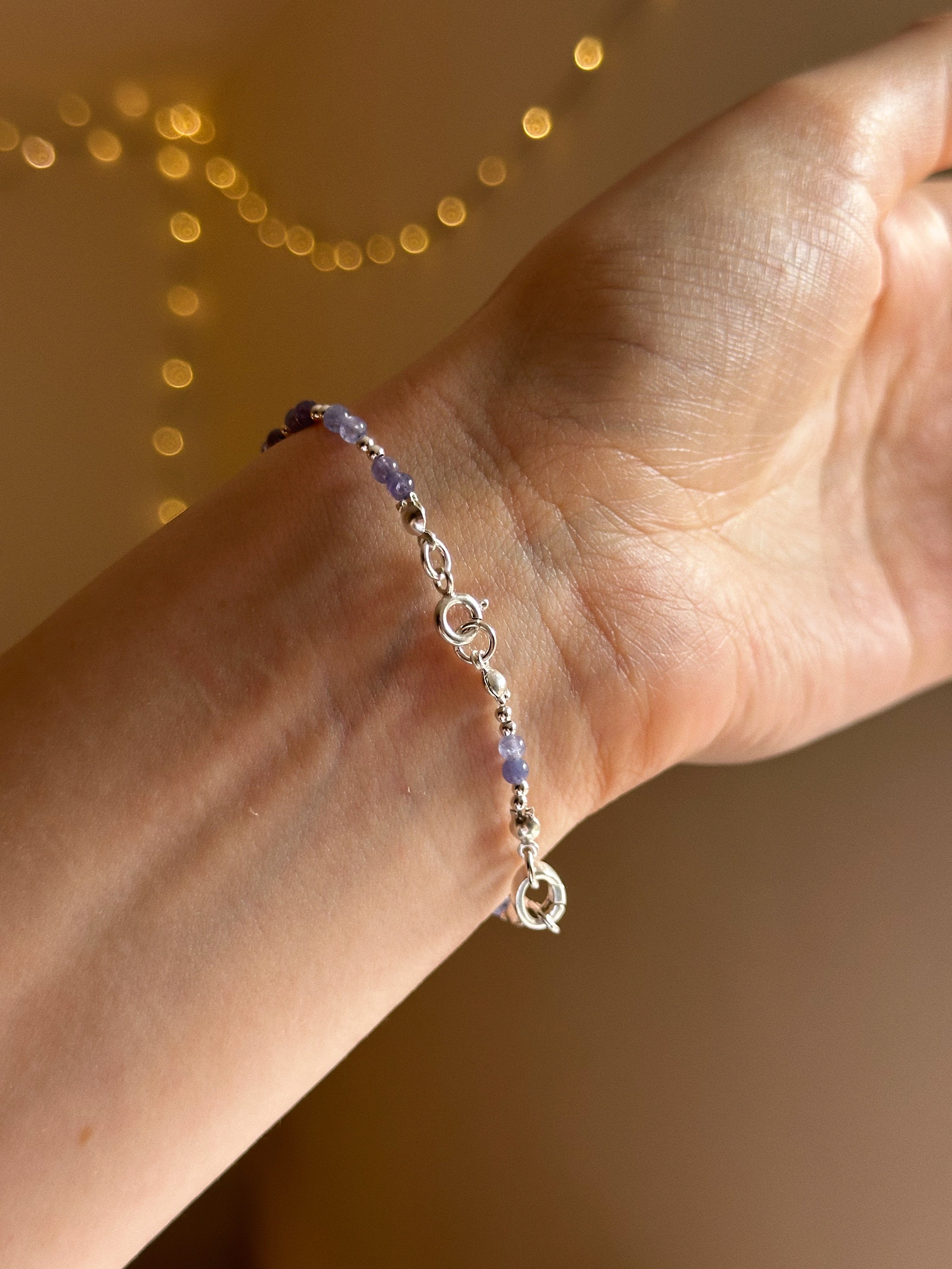 Tanzanite & silver charm keeper bracelet