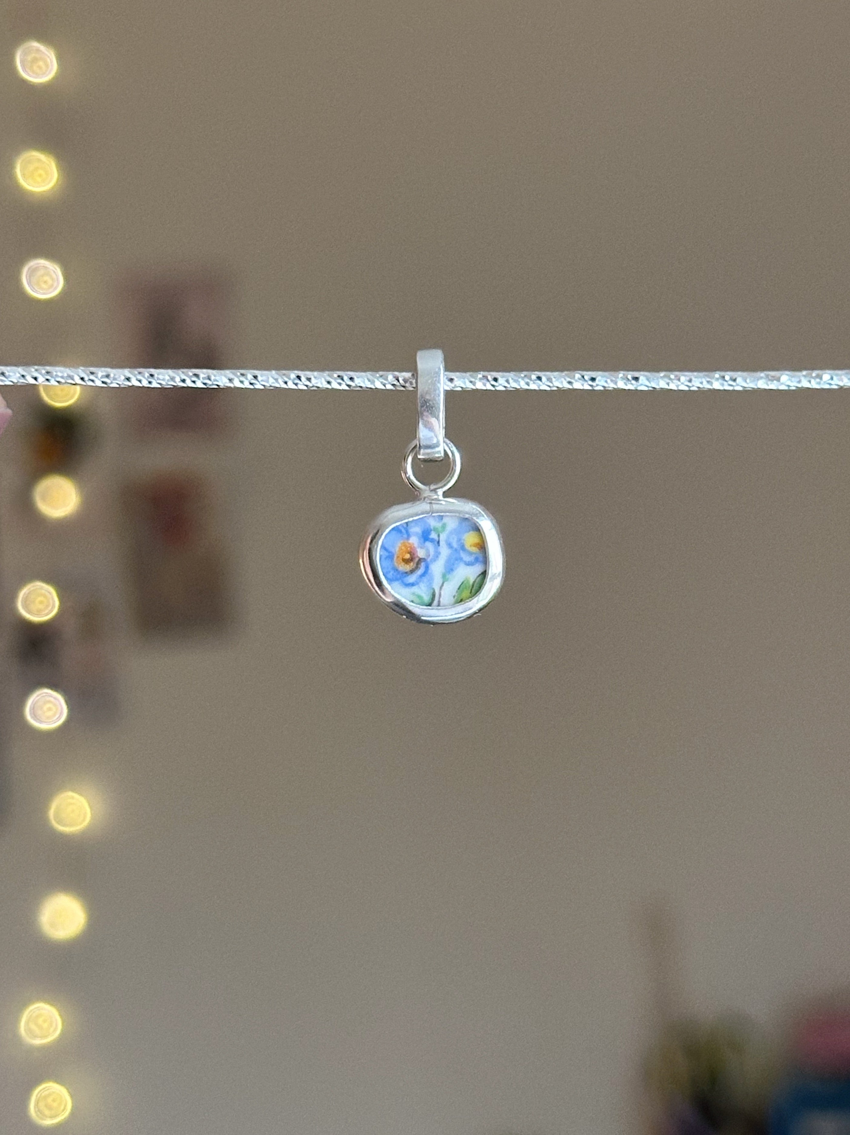 Vintage pottery charm