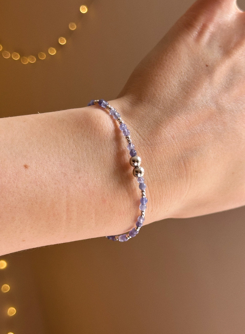 Tanzanite & silver charm keeper bracelet