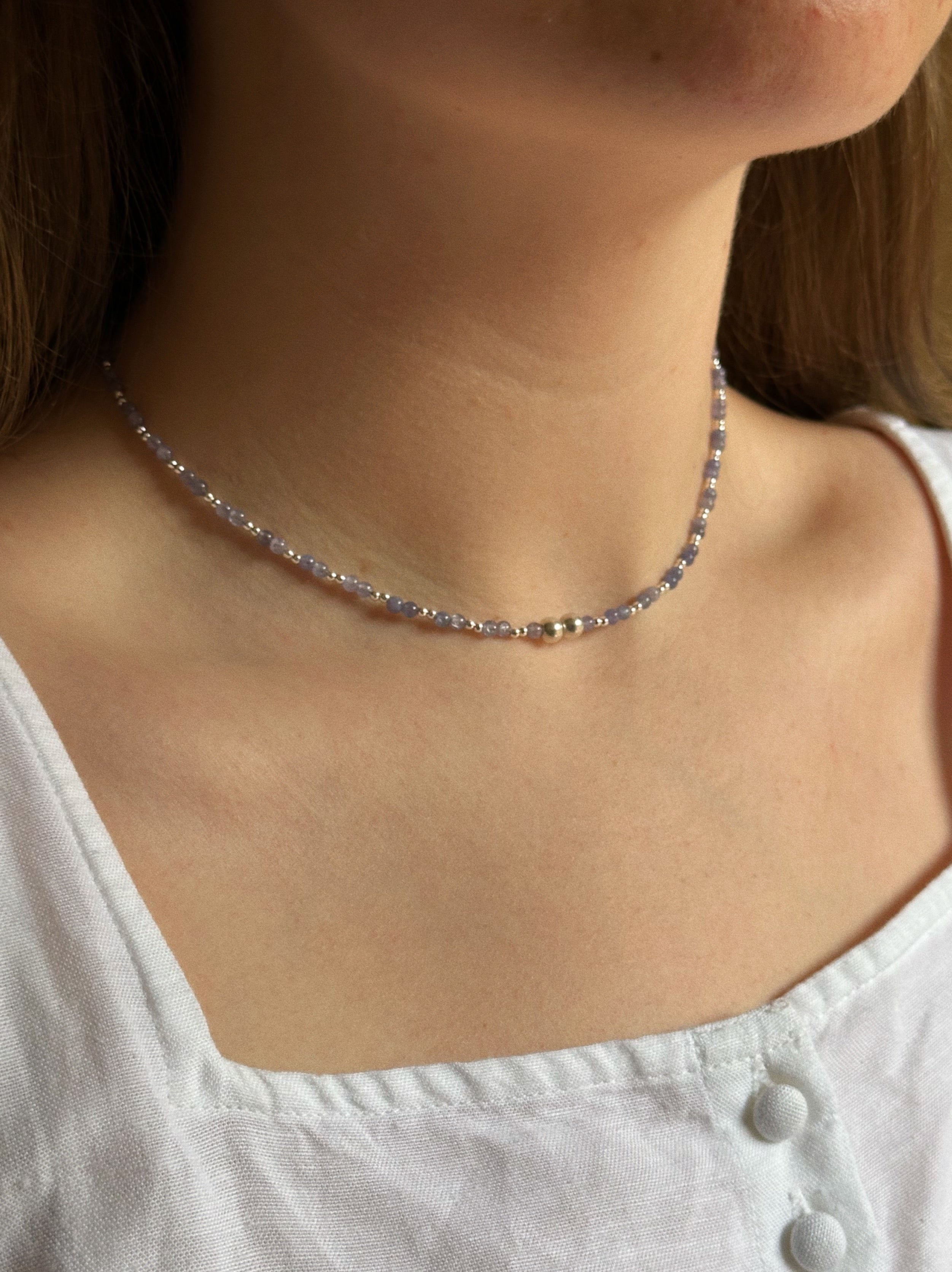 Tanzanite & silver charm keeper necklace