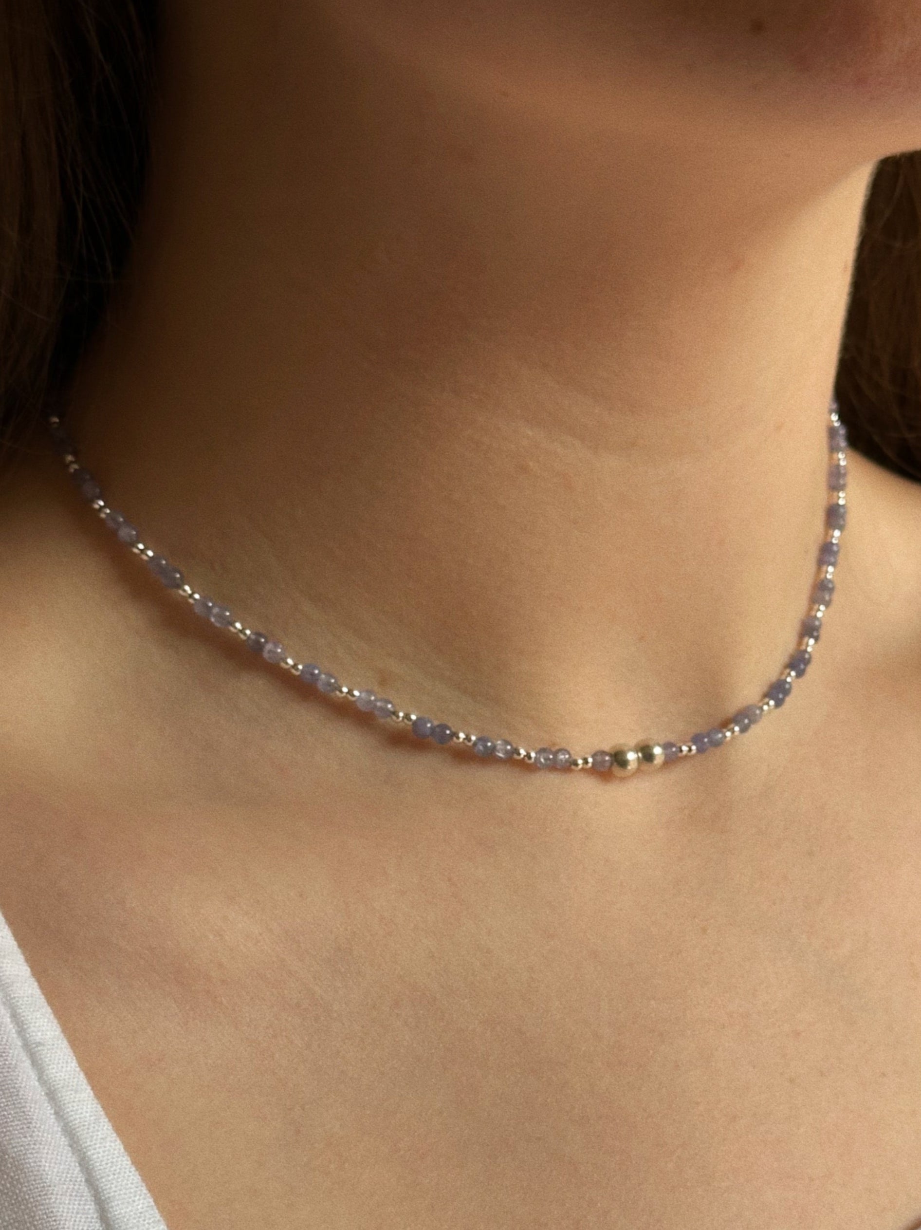 Tanzanite & silver charm keeper necklace