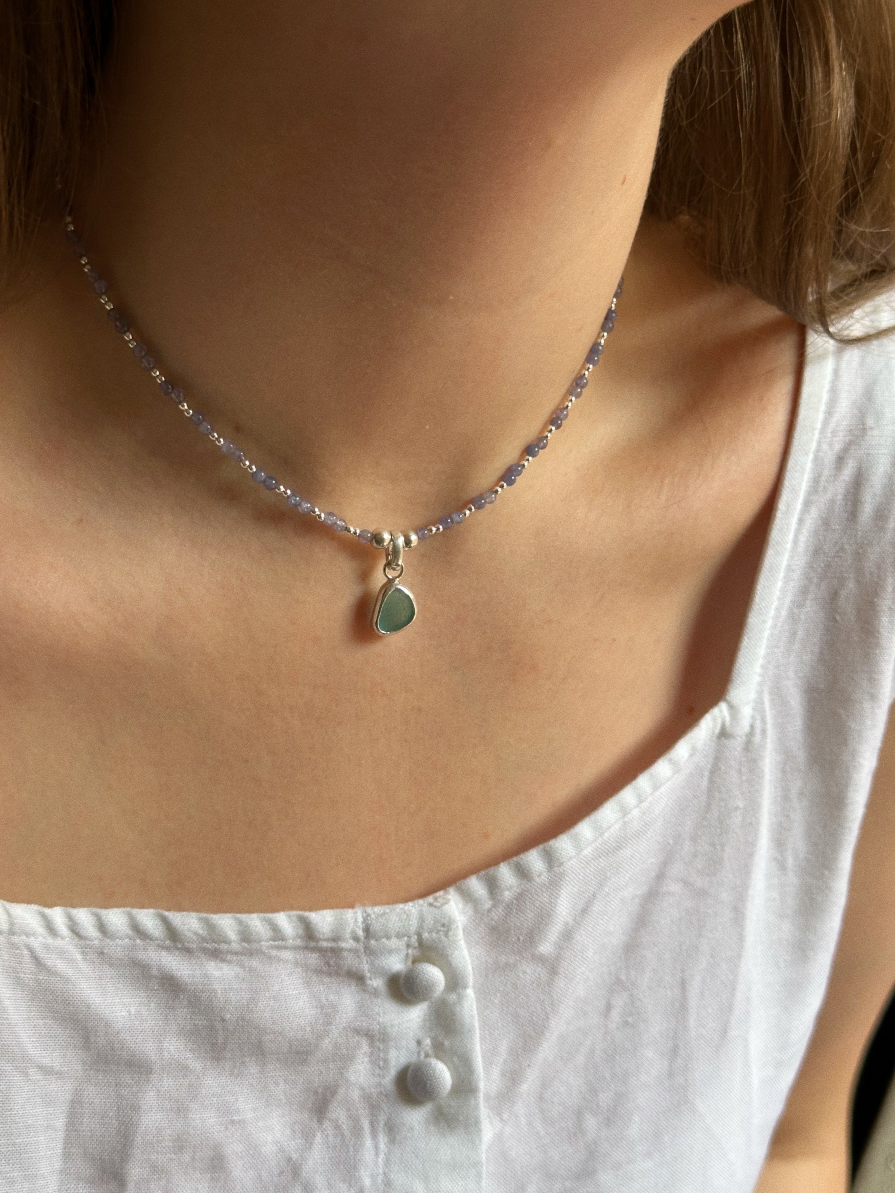 Tanzanite & silver charm keeper necklace