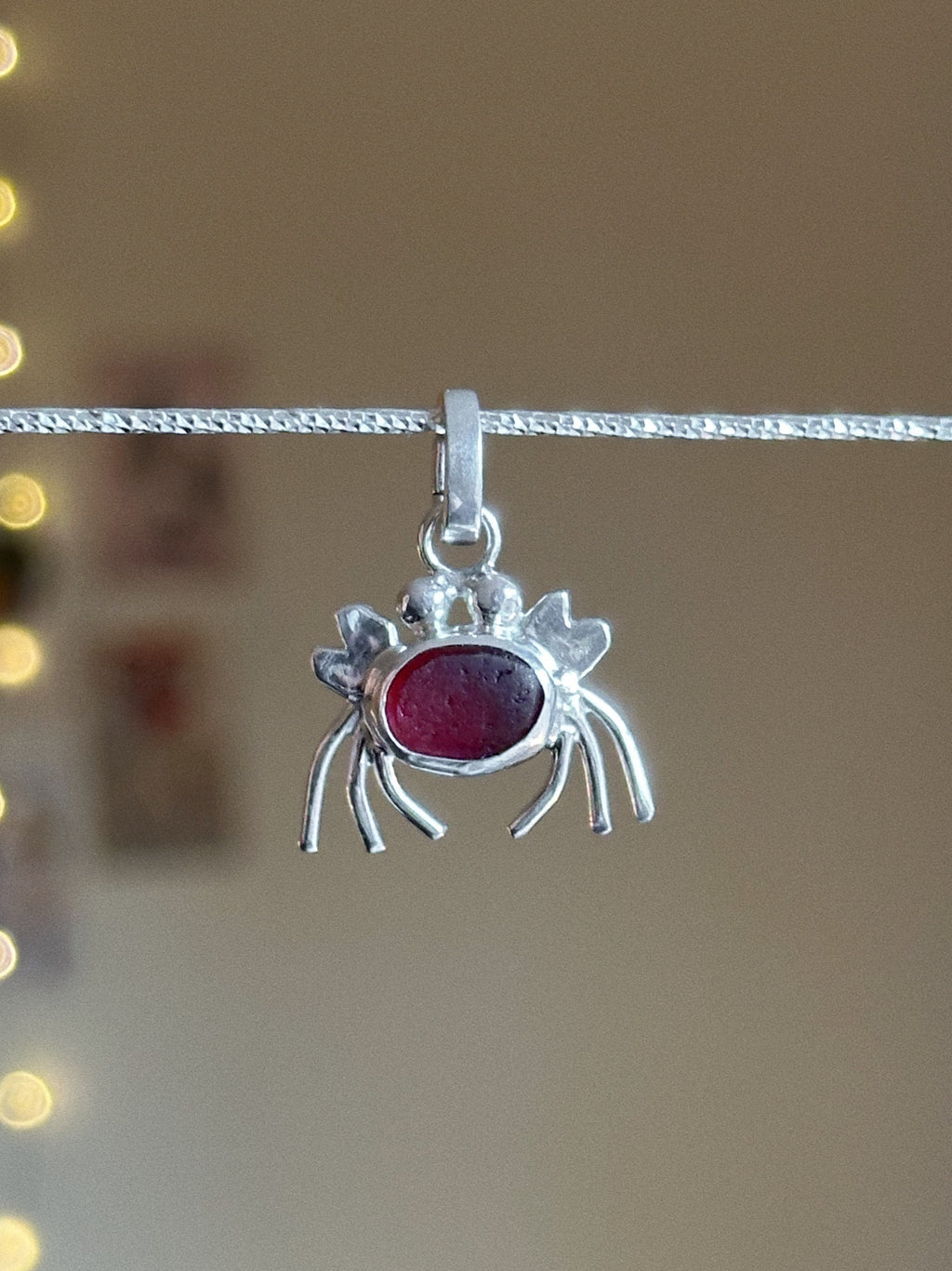 Dark pink sea glass crab