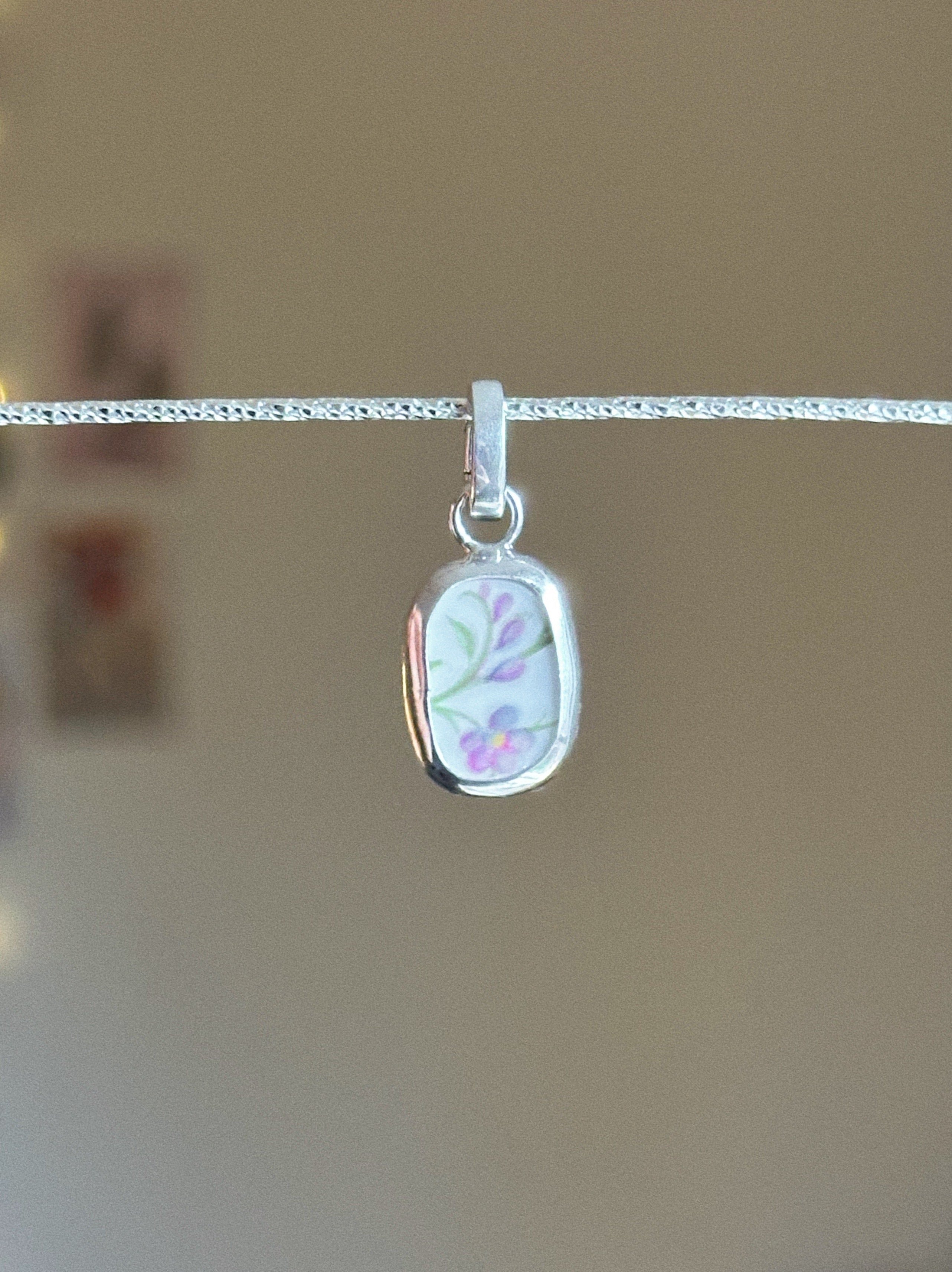 Vintage pottery charm