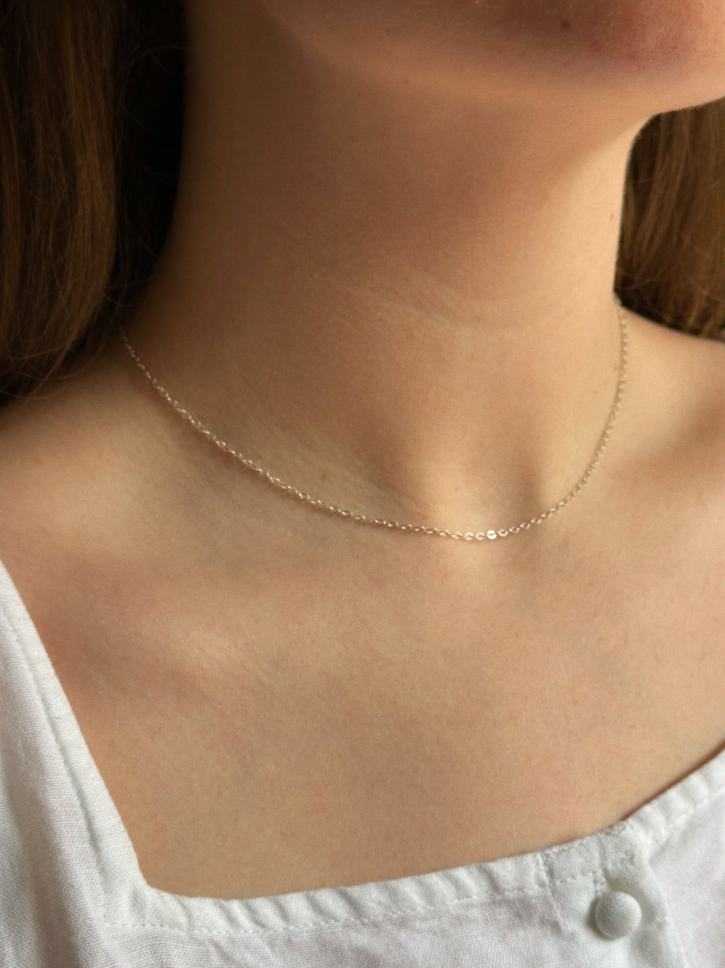 Flat cable charm keeper chain