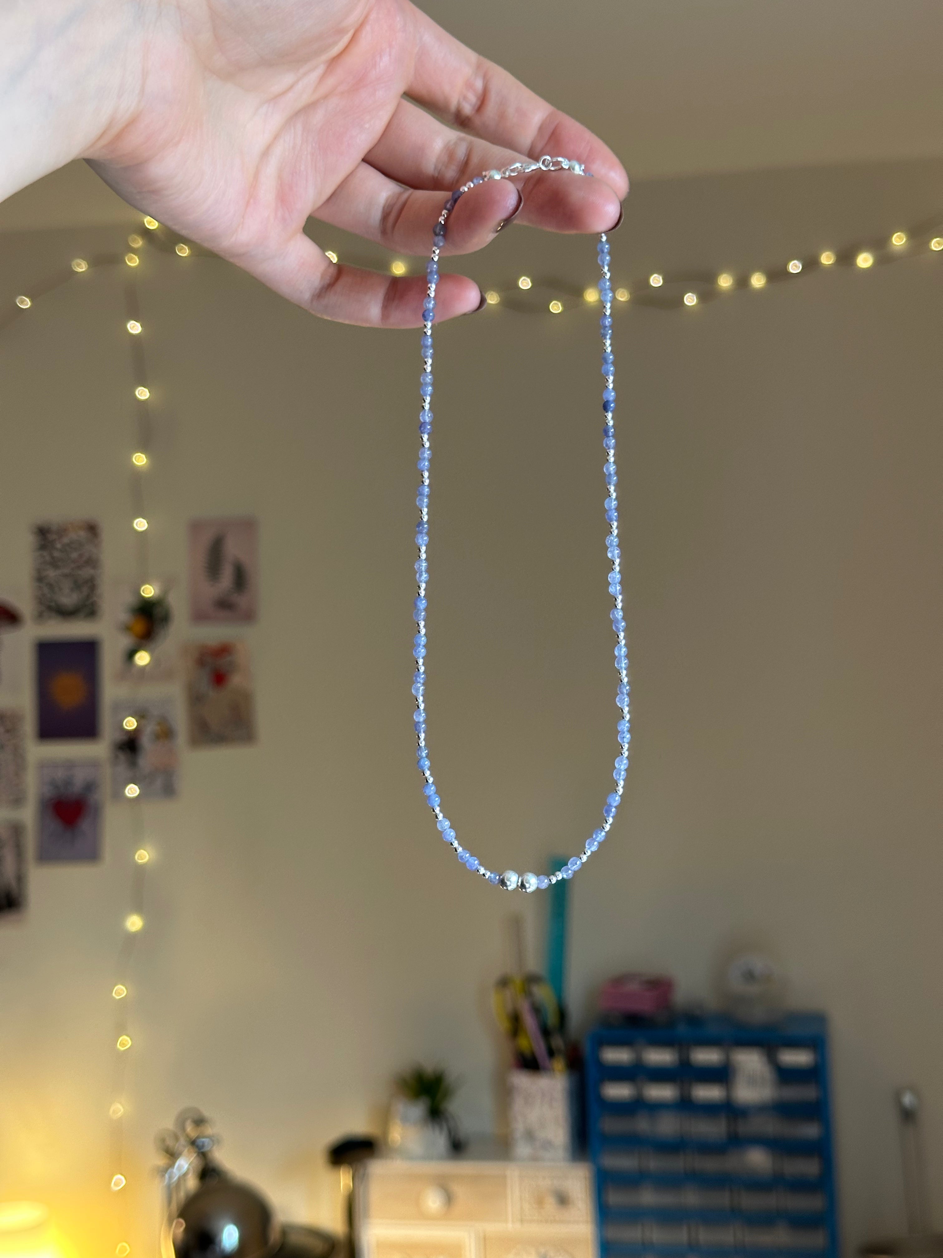 Tanzanite & silver charm keeper necklace